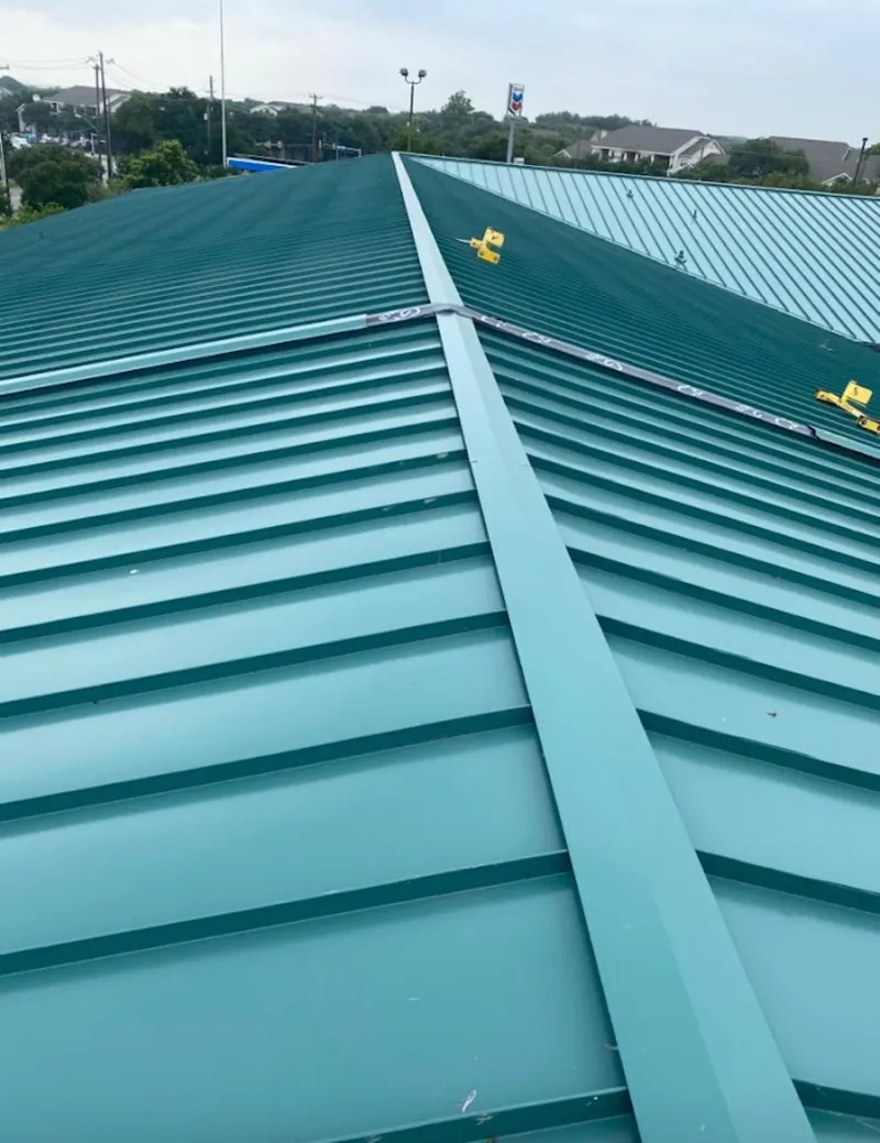 Green commercial metal roof ridge and valley for Metal Roof Repair in Jefferson City