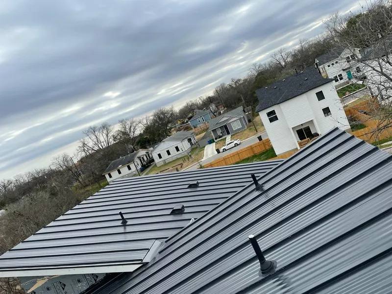 Standing seam metal roof panels with vents for Skylight Repair in Jefferson City